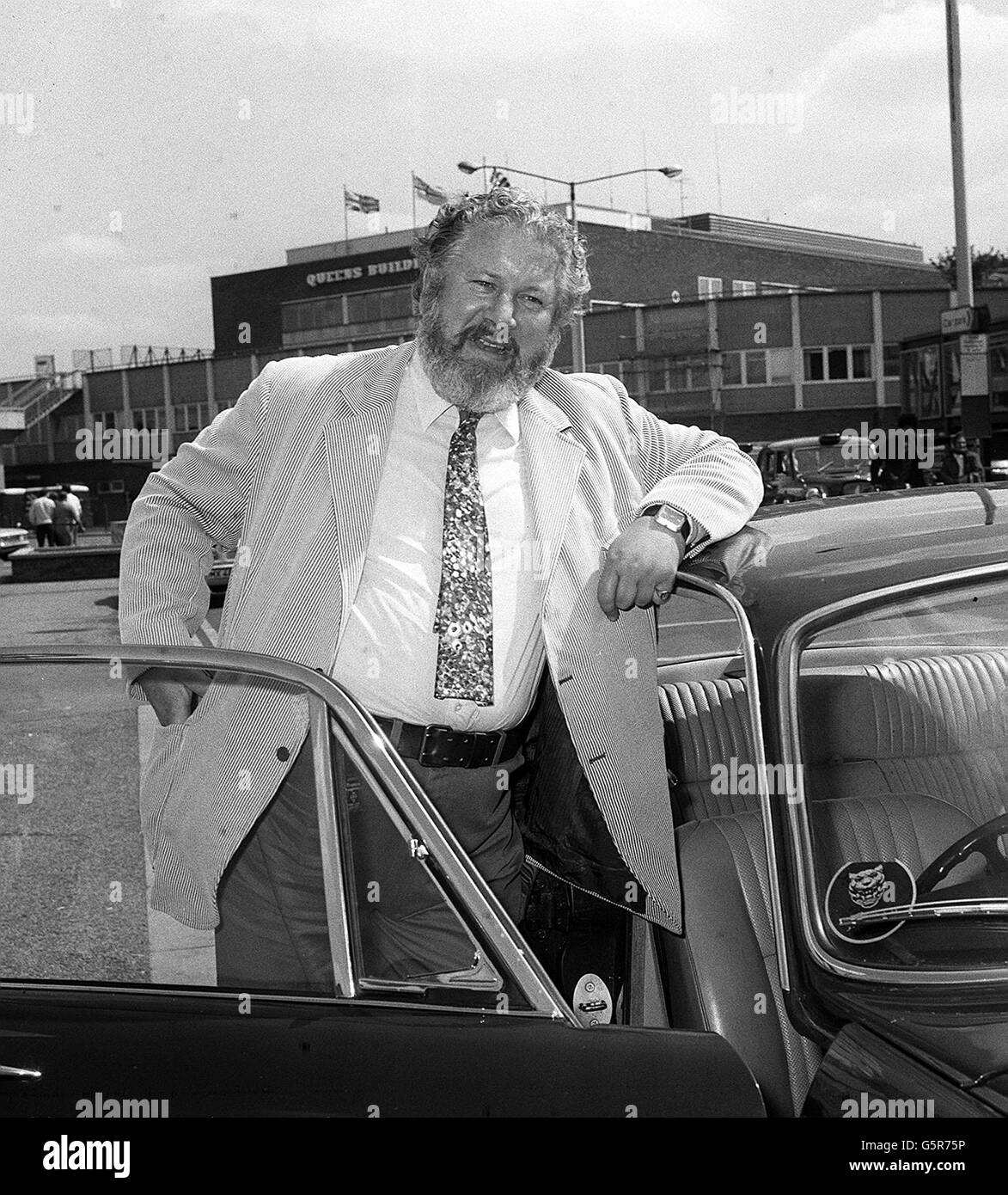 Peter Ustinov, the actor and playwright, was in a hurry when he arrived back from Paris at the airport. He is seen about to leave in a self-drive. ' I'm off to Wimbledon for the rest of the day', he told spectators. 'Tomorrow I get an honorary degree, and on Sunday I meet my new wife and take her to see my Mum.' Stock Photo