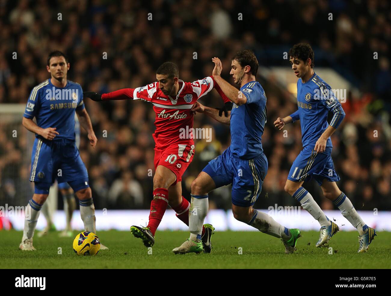 Queens Park Rangers' Adel Taarabt celebrates scoring his sides second goal  with his team mates. QPR beat Fulham 2:1Queens Park Rangers 15/12/12 Queens  Stock Photo - Alamy