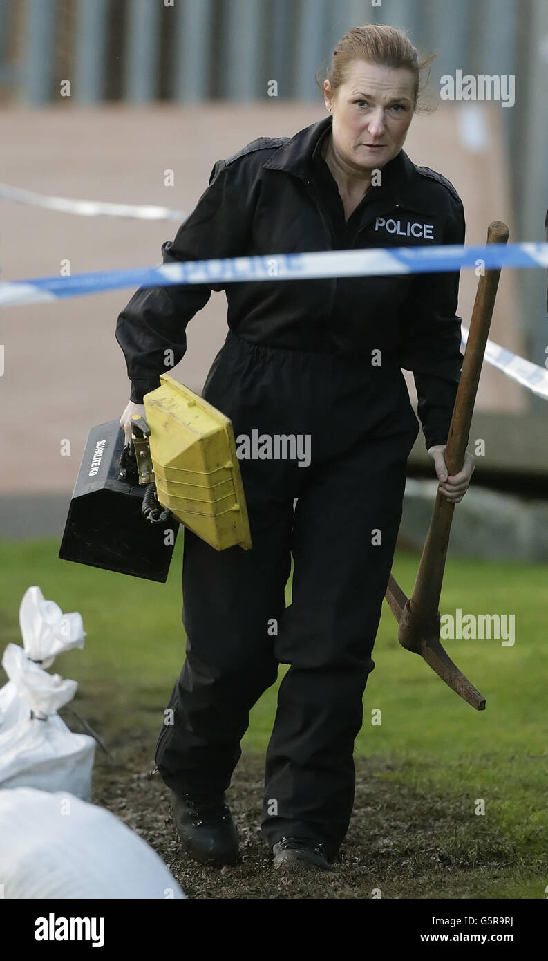 A police Officer at Old Monkland Cemetery in Coatbridge in Scotland