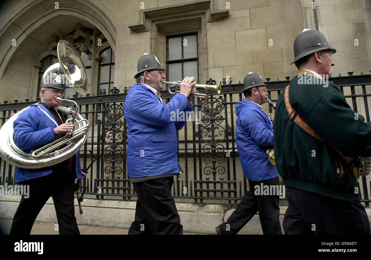Official police entertainers join a mass lobby by police officers protesting over pay and government reforms in Westminster, London. Stock Photo