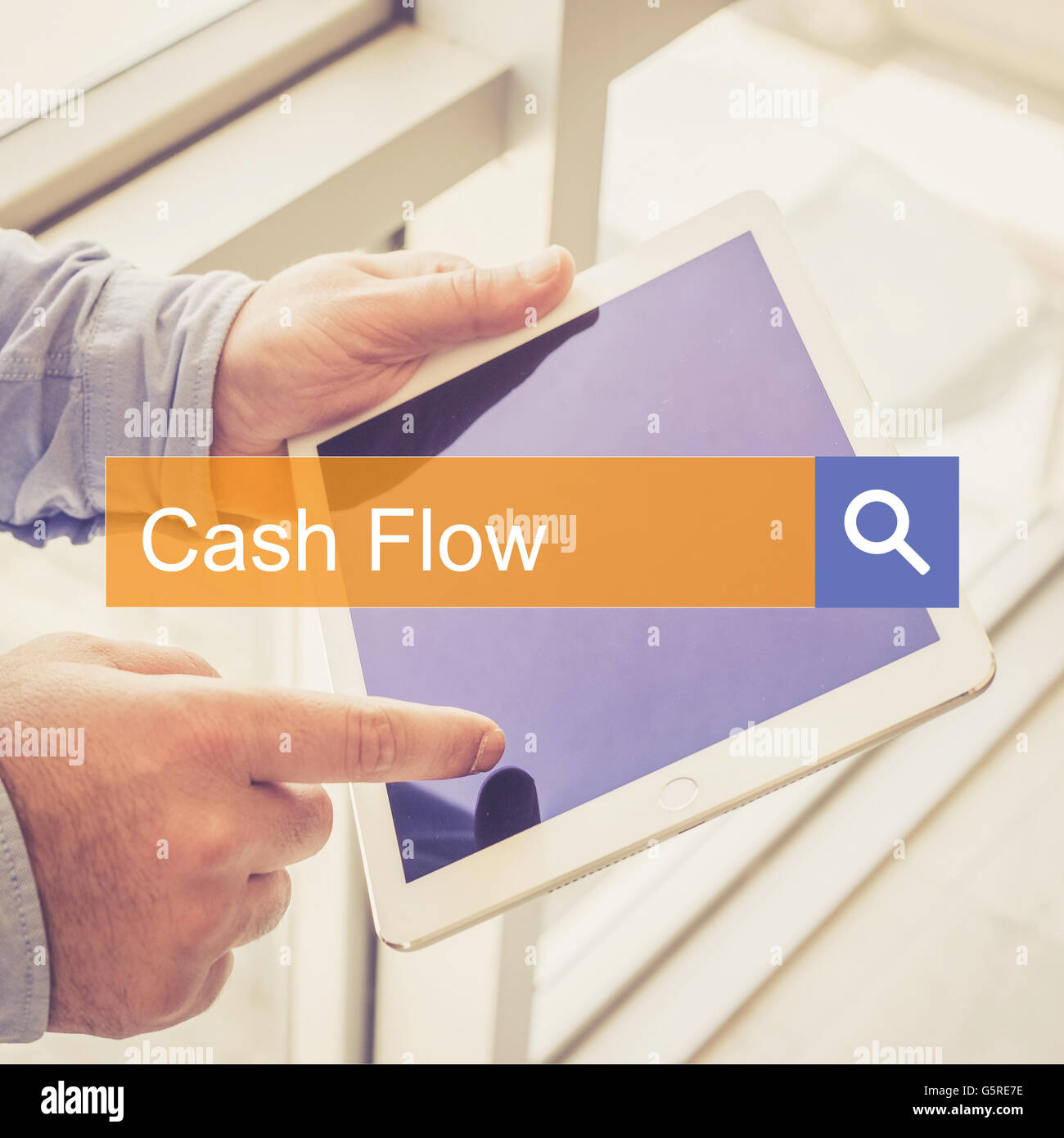 SEARCH TECHNOLOGY COMMUNICATION  Cash Flow TABLET FINDING CONCEPT Stock Photo