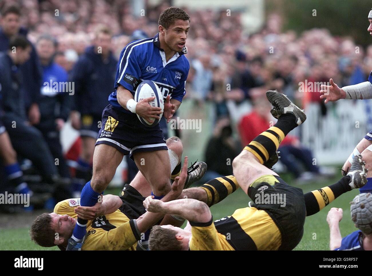 Sale's Jason Robinson escapes double Wasps' tackle during their Zurich