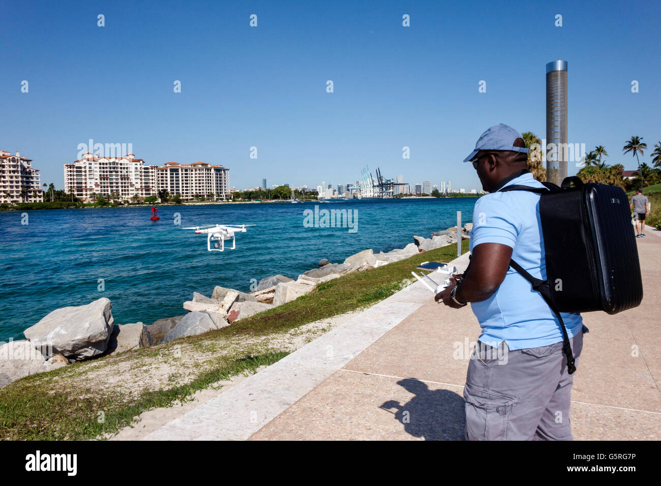 Miami Beach Florida,South Pointe Park,Government Cut,Biscayne Bay,Black adult,adults,man men male,working work worker workers,employee staff,NOAA,Sout Stock Photo