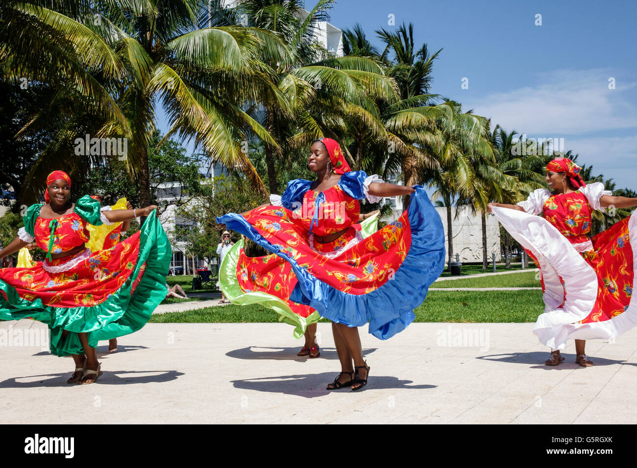 Miami Beach Florida,Haitian,adult adults,woman female women,dancers,costume,outfit,clothing,folk,quadrille,karabela dress,traditional,performers,Black Stock Photo
