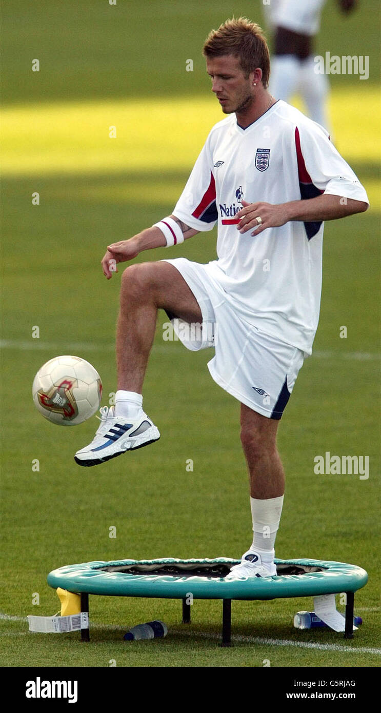 Beckham Running David beckham sporting new haircut continues training stadium in jeju ...