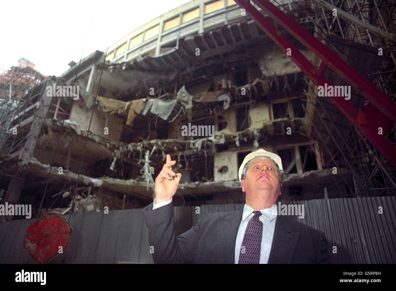 Heritage minister Robert Kee during a visit to the bomb-damaged Baltic Exchange in London. Stock Photo