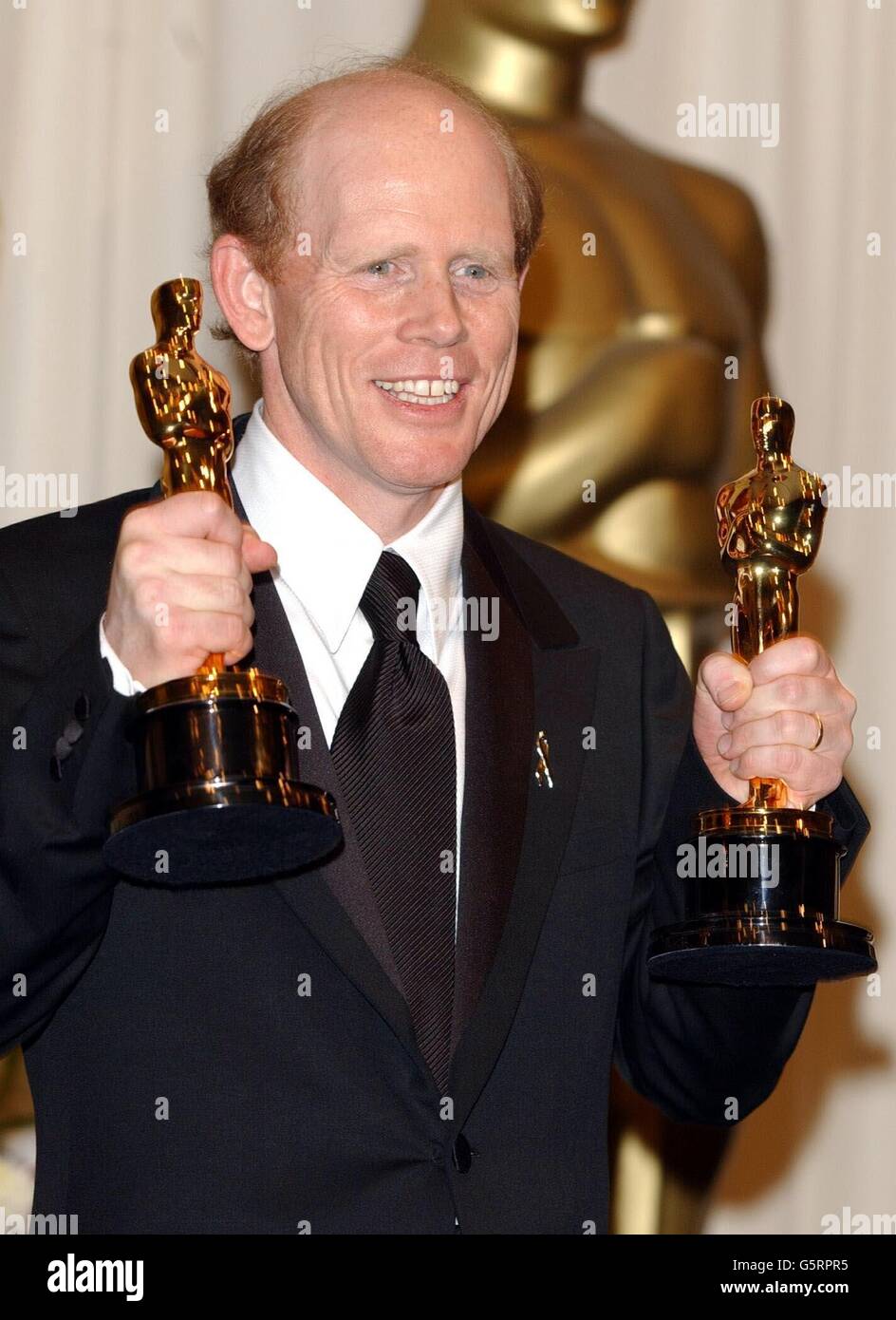 Ron Howard with his Best Director and Best Film awards for A Beautiful Mind at the 74th Annual Academy Awards (Oscars) at the Kodak Theatre in Hollywood, Los Angeles. Stock Photo