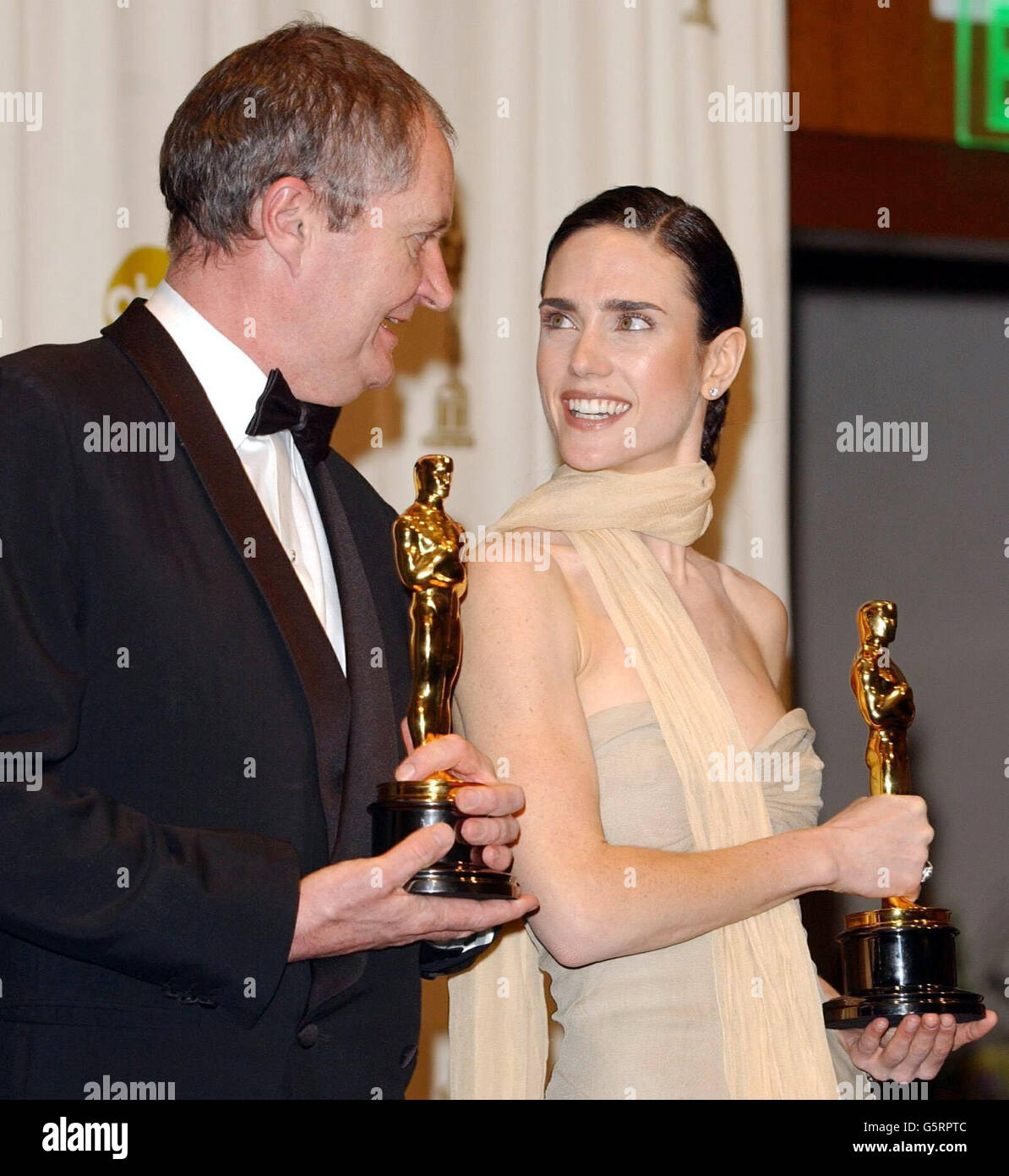 Jennifer Connelly with her Best Supporting Actress Award for the film A Beautiful Mind and Jim Broadbent with his Best Supporting Actor award for Iris at the 74th Annual Academy Awards (Oscars) at the Kodak Theatre in Hollywood, Los Angeles. Stock Photo