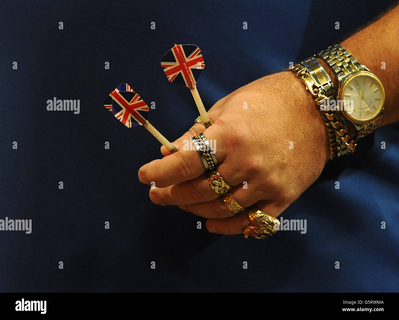 Darts - 2013 BDO World Professional Darts Championships - Day Nine - Lakeside Complex. Detailed view of England's Tony O'Shea holding two of his Union Flag flighted darts Stock Photo