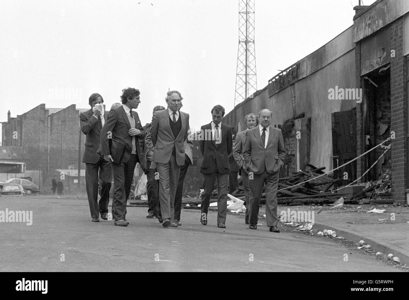 Sports Minister Neil Macfarlane (second left) and FA chairman Bert Millichip (right) inspect the wreckage at Bradford City's Valley Parade ground, where 56 people died and 265 were injured as a fire swept the packed stand just before half-time of the game against Lincoln City. Stock Photo