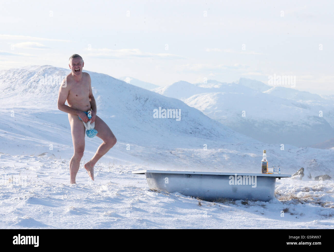 Spook Munro walks in the snow after having a cold bath during a photocall at Nevis Range Mountain Experience, near Fort William during the launch of the Fort William Mountain Festival 2013, being staged from Thursday 21 to Sunday 24 February at Fort William. Stock Photo