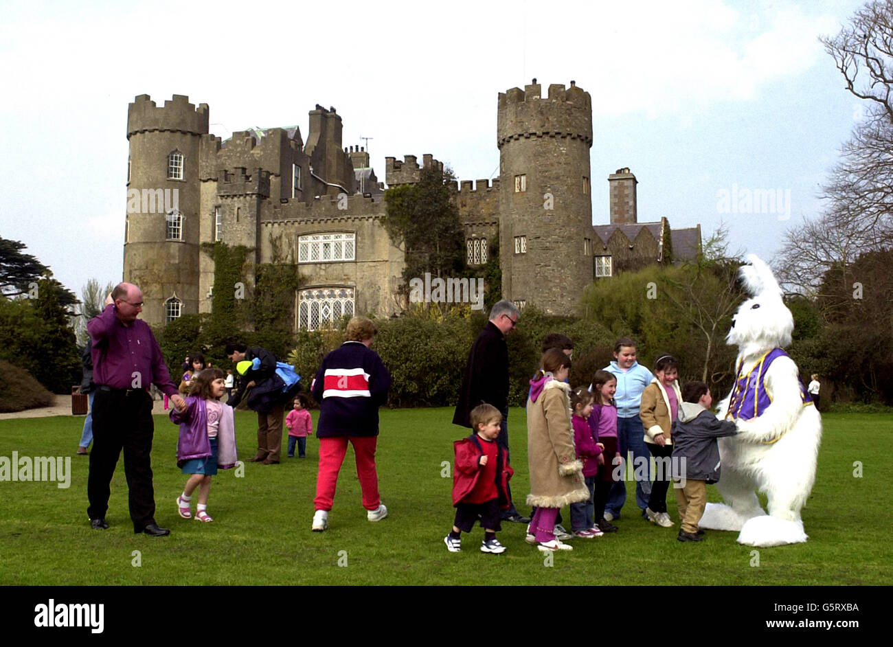 Families gather around an Easter Bunny at Malahide Castle to the North of Dublin, where a