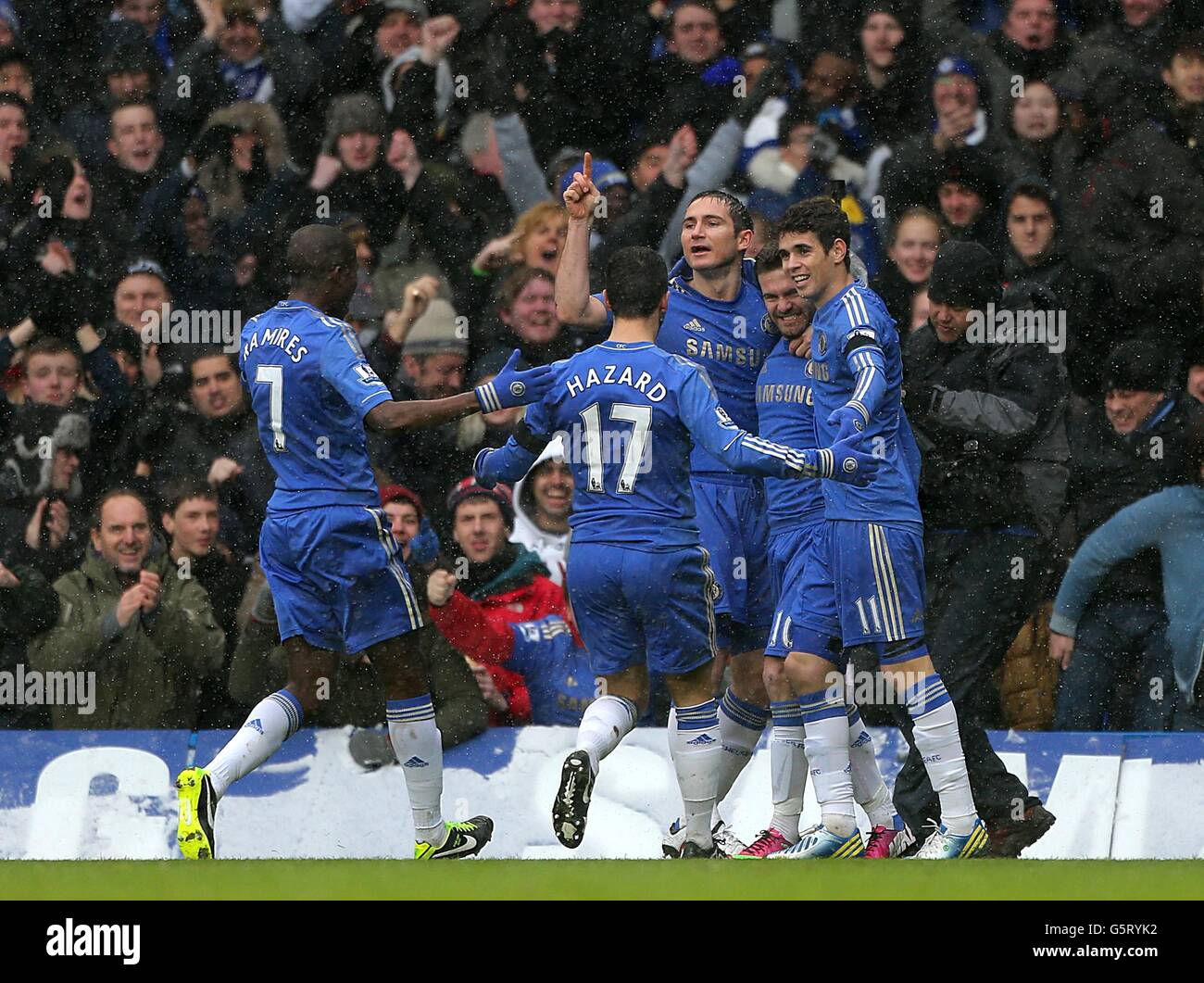 Chelsea's Juan Mata (second right) celebrates scoring his side's first goal of the game with teammates Stock Photo