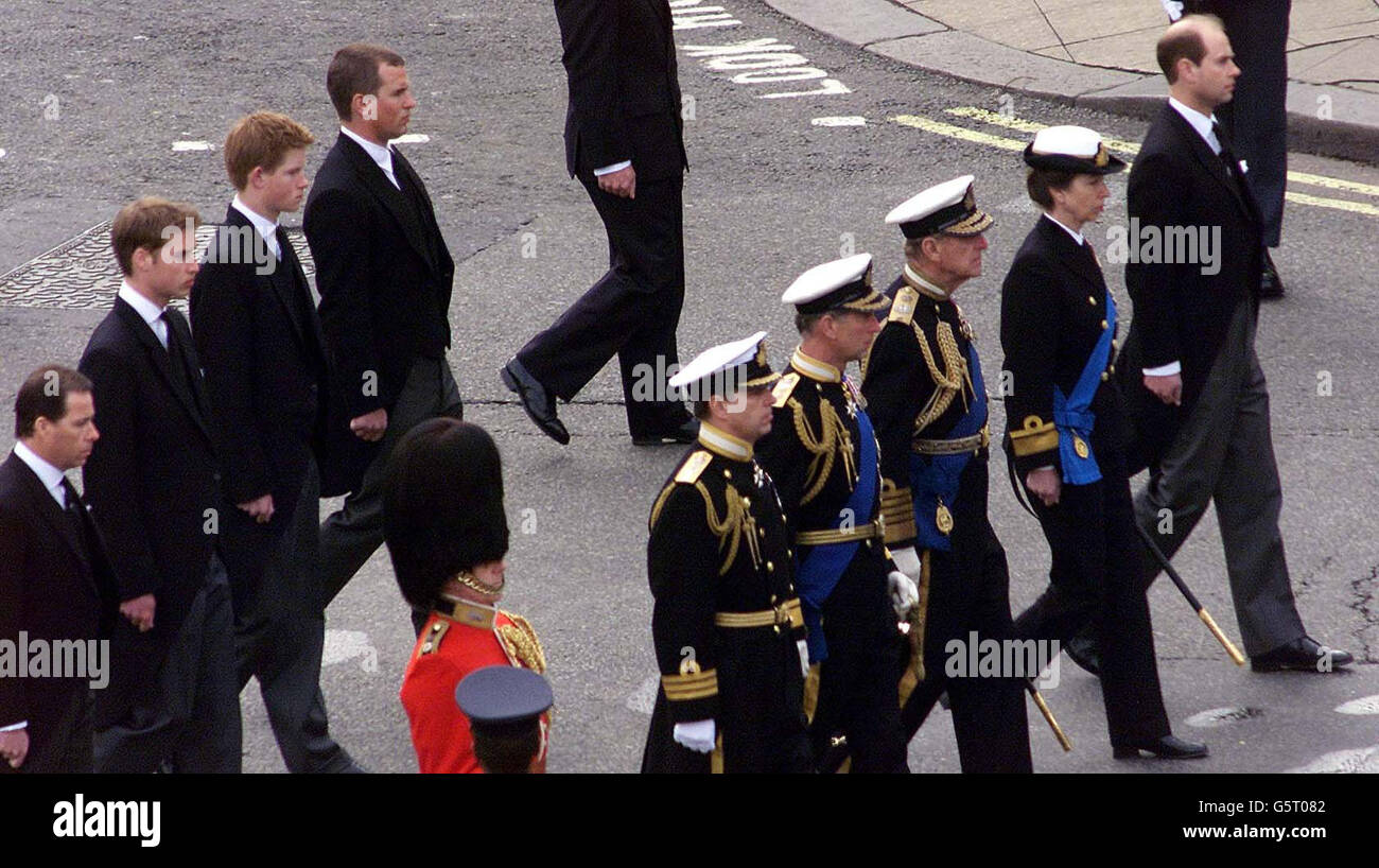 From back, left - Viscount Linley, Prince William, Prince Harry, Peter Phillips (from front, left) The Duke of York, The Prince of Wales, The Duke of Edinburgh, The Princess Royal and The Earl of Wessex follow the coffin of Queen Elizabeth , the Queen Mother. * .... on its way to Westminster Abbey. After the service, the Queen Mother's coffin will be taken to St George's Chapel in Windsor, where she will be laid to rest next to her husband, King George VI. Stock Photo