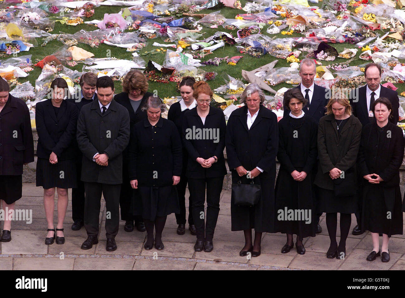 Staff from the Royal Household pay their respects outside St
