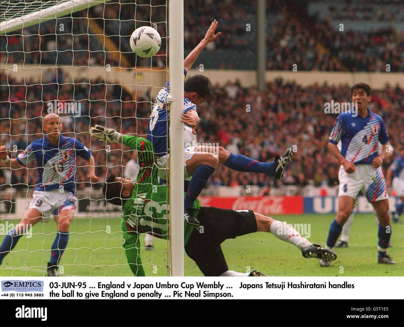 03-JUN-95, England v Japan Umbro Cup Wembley, Japans Tetsuji Hashiratani handles the ball to give England a penalty Stock Photo