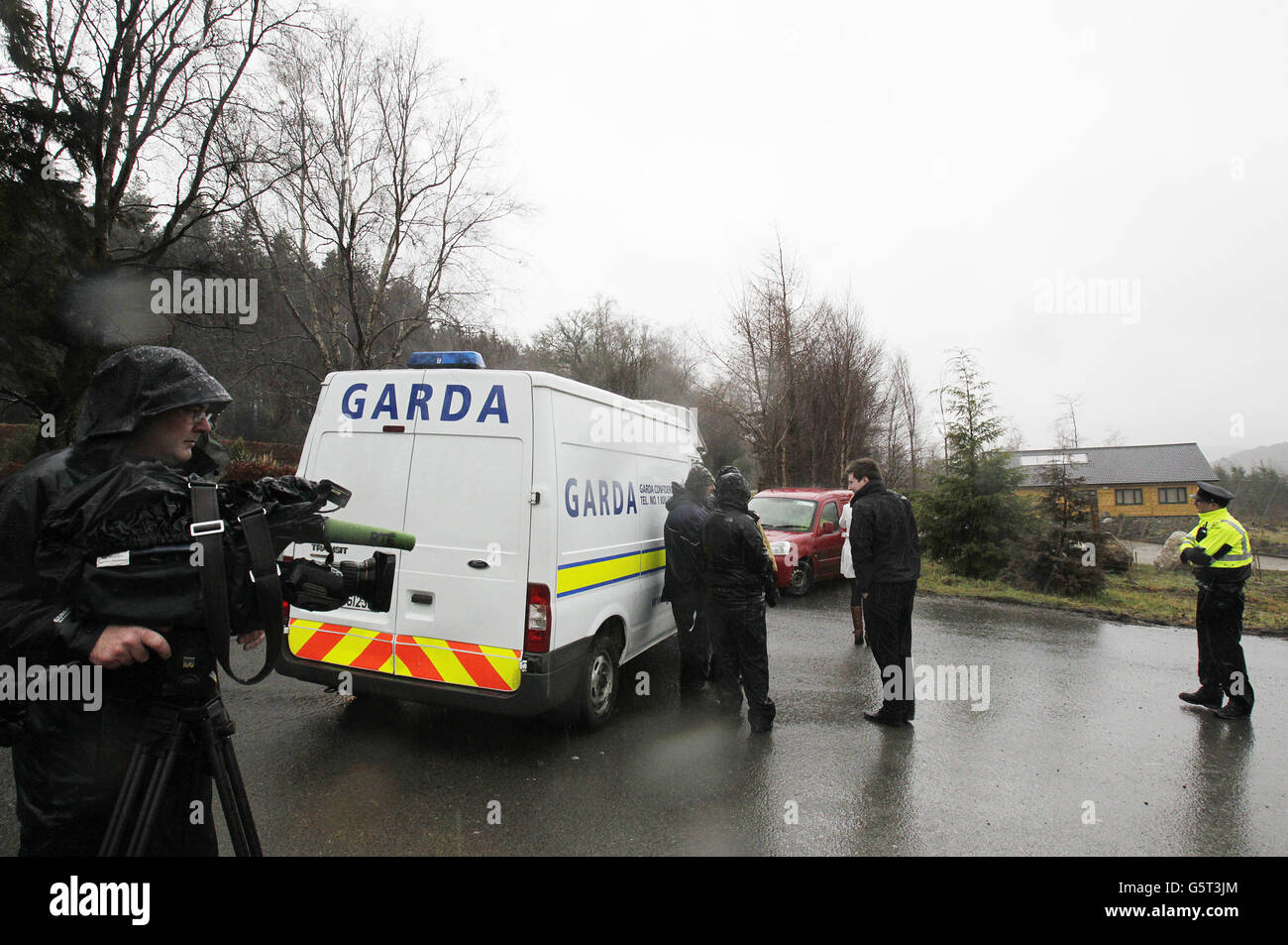 Gardai at the scene in Trooperstown Wood near Laragh Co.Wicklow where the body of a missing criminal was dumped in a ravine in woods. Philip O'Toole was last seen more than two weeks ago leaving the house he was sharing with friends in Arklow, Co Wicklow. Stock Photo