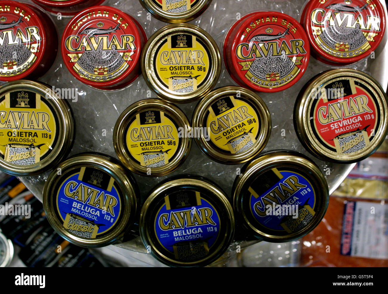 Caviar on sale on board the 'World', the 182 million ship on which the mega-rich will live permanently in luxury apartments, as it lays at anchor in Greenwich, London. The 648ft-long vessel weighing 43,000-tonnes, has 110 apartments on board. *...most of which have already been sold. The apartments range in price from 1.4 million to more than 5 million, and in size from 1,106 to 3,242 sq ft. The vessel also has 88 suites for rent, as well as all the shops, restaurants, and recreational facilities that might be expected in a small, wealthy town. Stock Photo