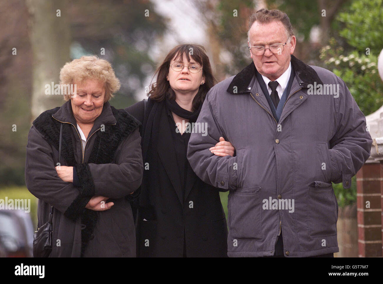 Kenneth and Pauline Cottle and their daughter Mandy (centre), speak outside Eastbourne Coroner's Court, Monday April 15, 2002, after the inquest into the death of their daughter Paula Ramsden ended with an open verdict. *...Mrs Ramsden fell to her death from Beachy Head, East Sussex in January 2000. Her husband Paul claims she slipped as they kissed on the clifftop. Stock Photo