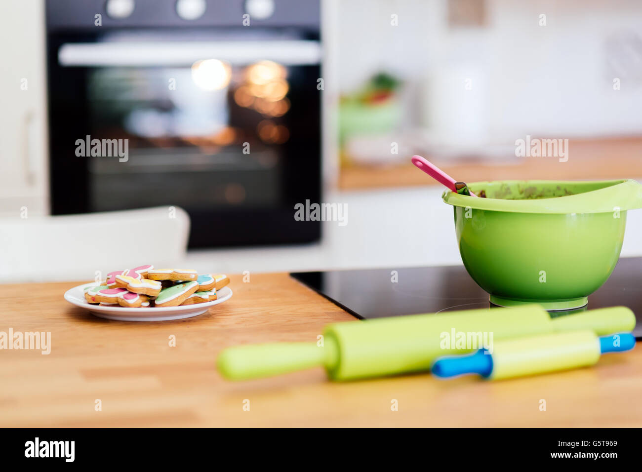 Cookies being made in kitchen Stock Photo Alamy