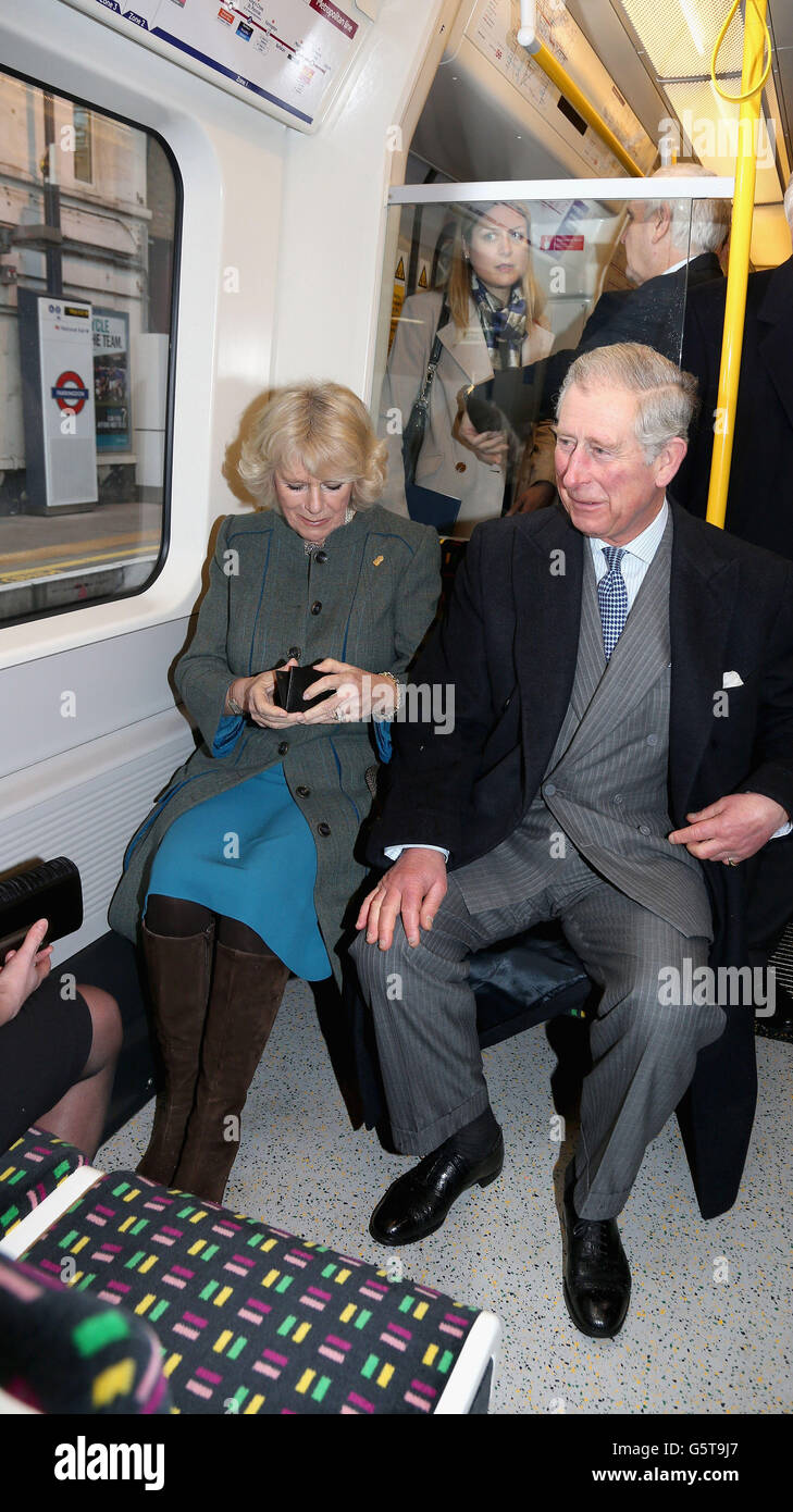 The Duchess of Cornwall and The Prince of Wales, travel on a Metropolitan underground train from Farringdon to Kings Cross as they mark 150 years of London Underground. Stock Photo