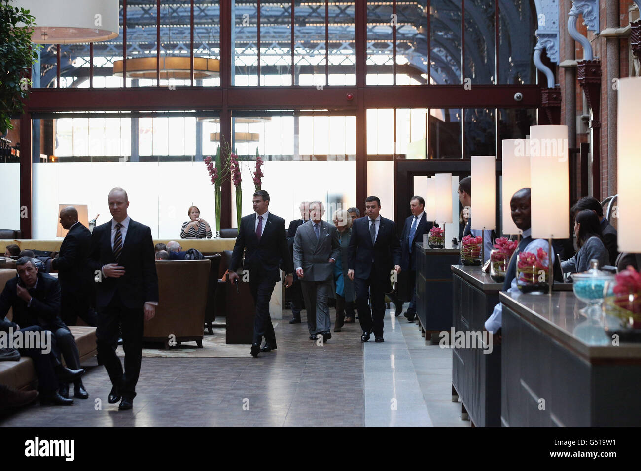 The Prince of Wales (centre) and The Duchess of Cornwall visit the recently regenerated St Pancras Renaissance London Hotel, adjacent to St Pancras International Station in London as they mark 150 years of London Underground. Stock Photo