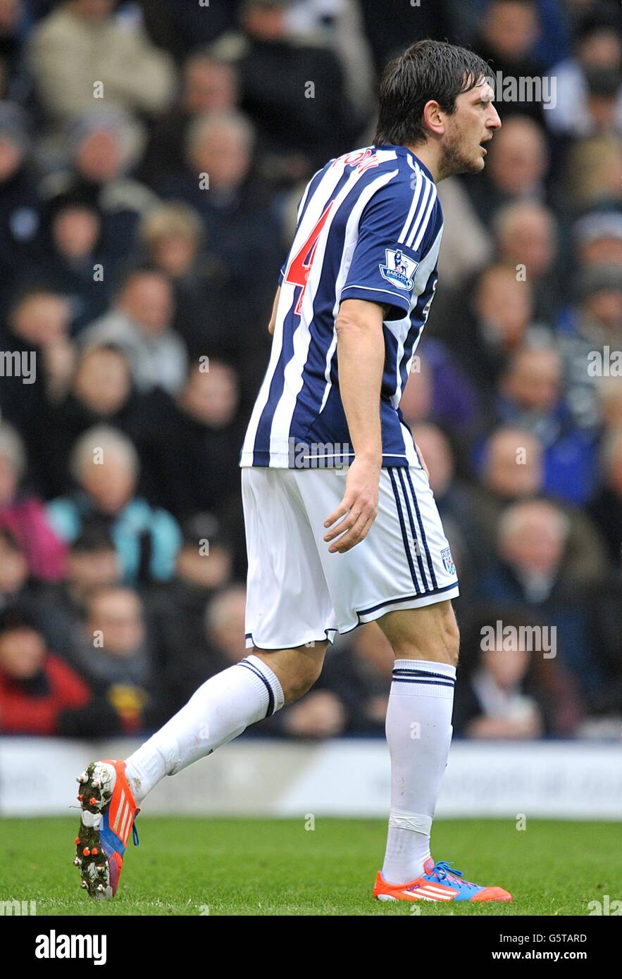 Soccer - Barclays Premier League - West Bromwich Albion v Tottenham Hotspur - The Hawthorns. West Bromwich Albion's Goran Popov leaves the field after being sent-off by match referee Mark Clattenburg (not in picture) Stock Photo