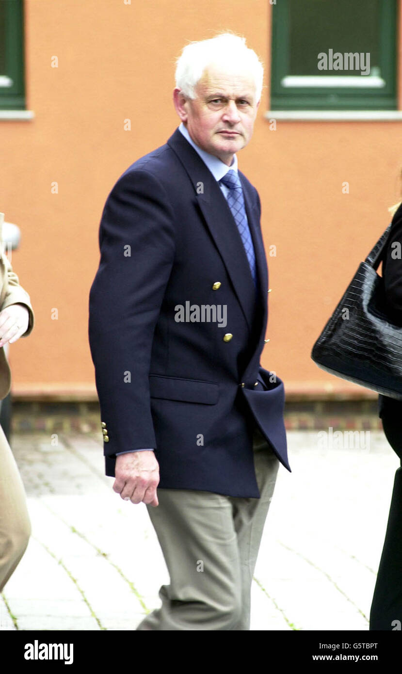 Daniel Mungovan leaves Southwark Coroner's Court in south London where the inquest into the death of his son, Michael, 22, opened. Michael, was studying at Brunel University in west London and came from County Clare in the Irish Republic. * was working as part-time railway maintenance worker near Vauxhall station in south London when he was struck by a train in the early hours of October 9 2000, the hearing was told. Stock Photo