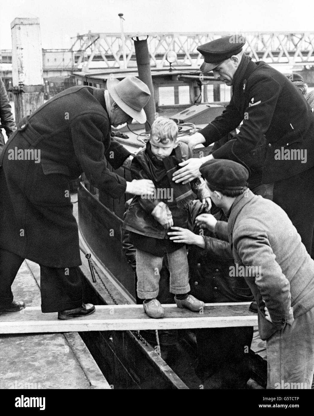 Environment - A boy is rescued from flood waters - Dordrecht - Holland Stock Photo