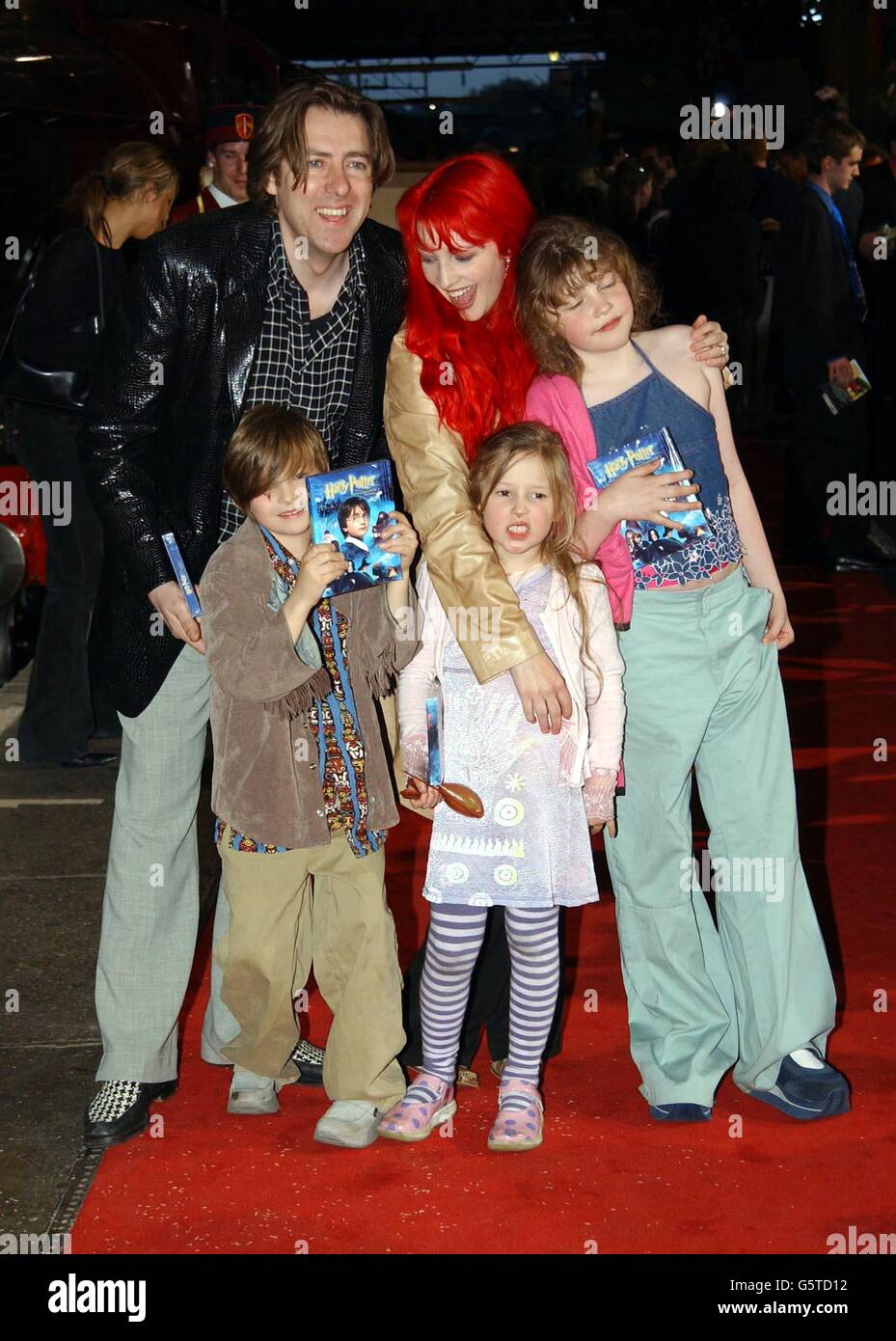Jonathan Ross and his wife Jane Goldman with their children (from left) Harvey Kirby, Honey Kinny and Betty Kitten at King's Cross St Pancras, central London, for the Harry Potter & The Philosopher's Stone - DVD & video launch party. Stock Photo