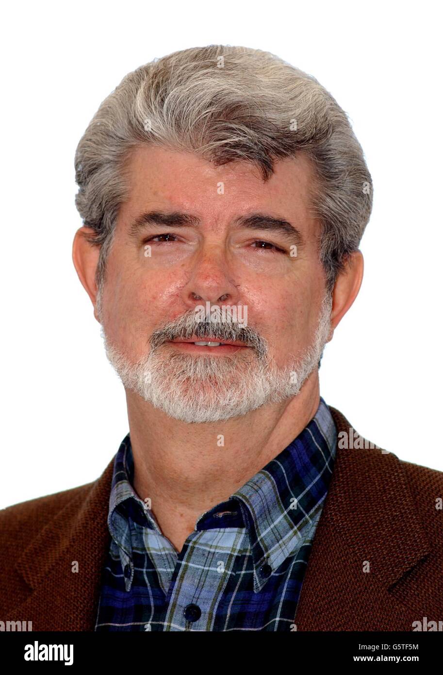 Film director George Lucas poses during a photocall to promote his new