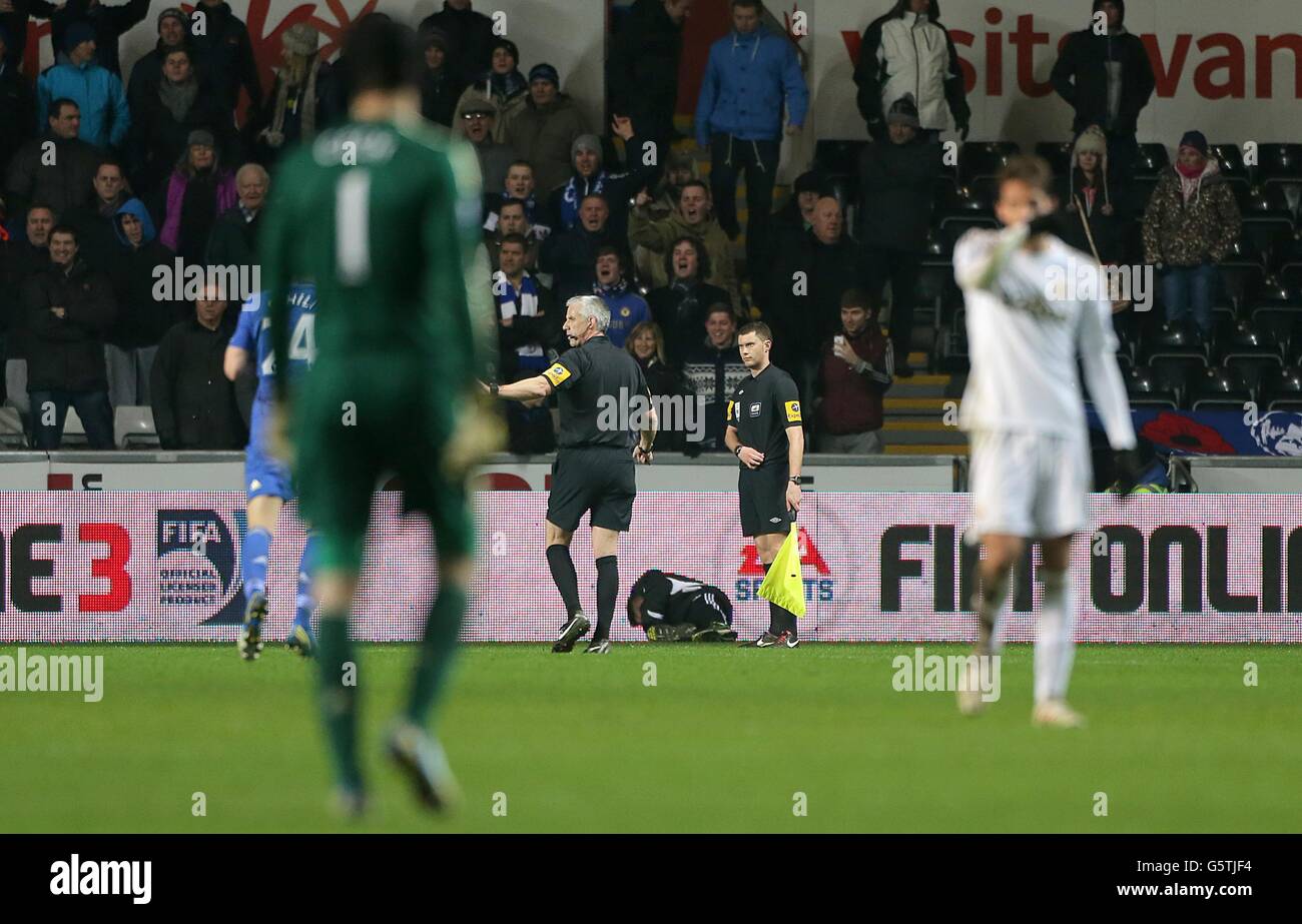 A Ball Boy Lies On The Ground Following An Incident With Chelsea S Eden Hazard Stock Photo Alamy