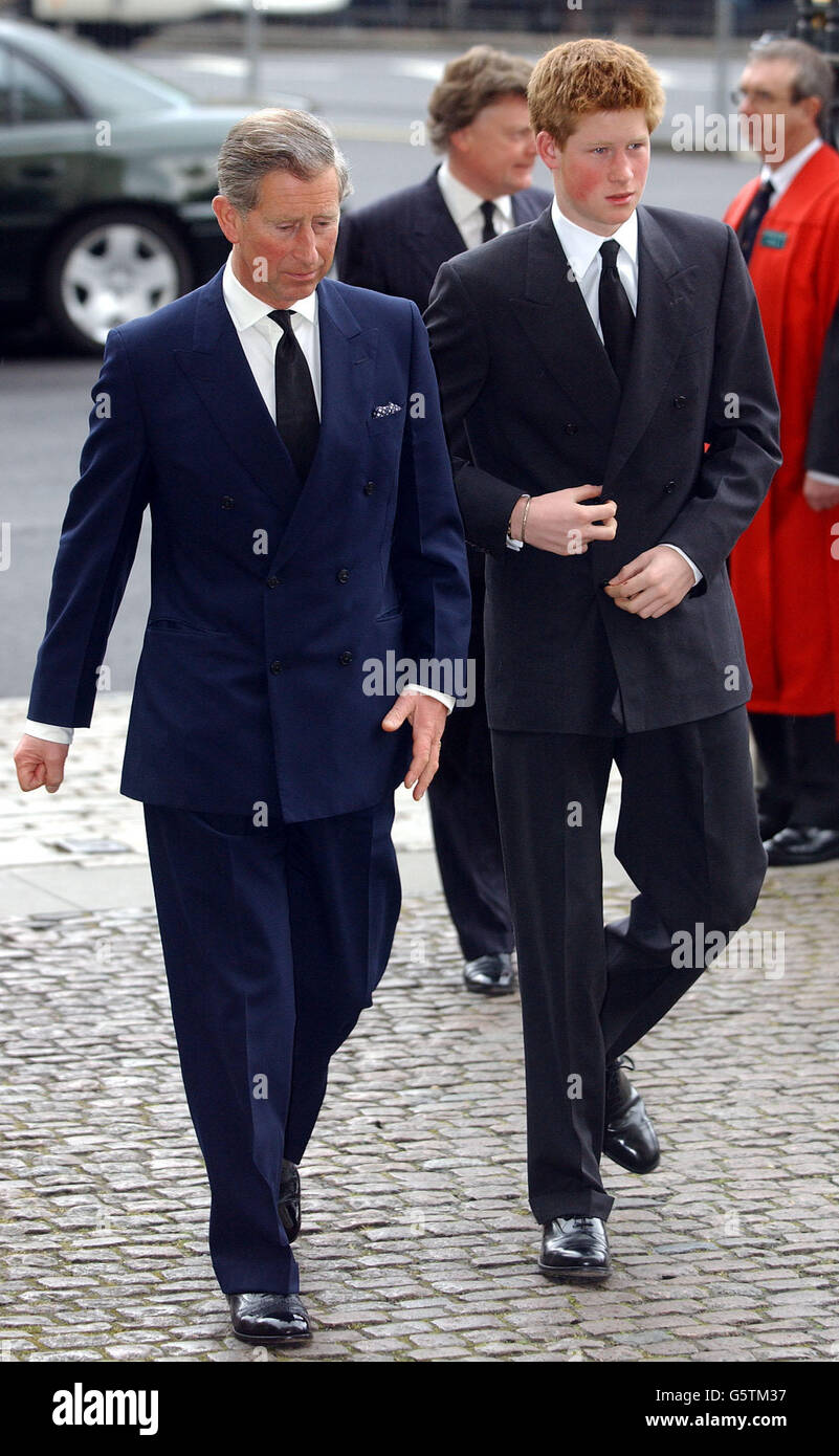 Prince Charles and his younger son, Prince Harry. arrive for Princess Margaret's memorial service at Westminster Abbey, London. Princess Margaret, the younger sister of Britain's Queen Elizabeth II, died on February 9, aged 71. Stock Photo