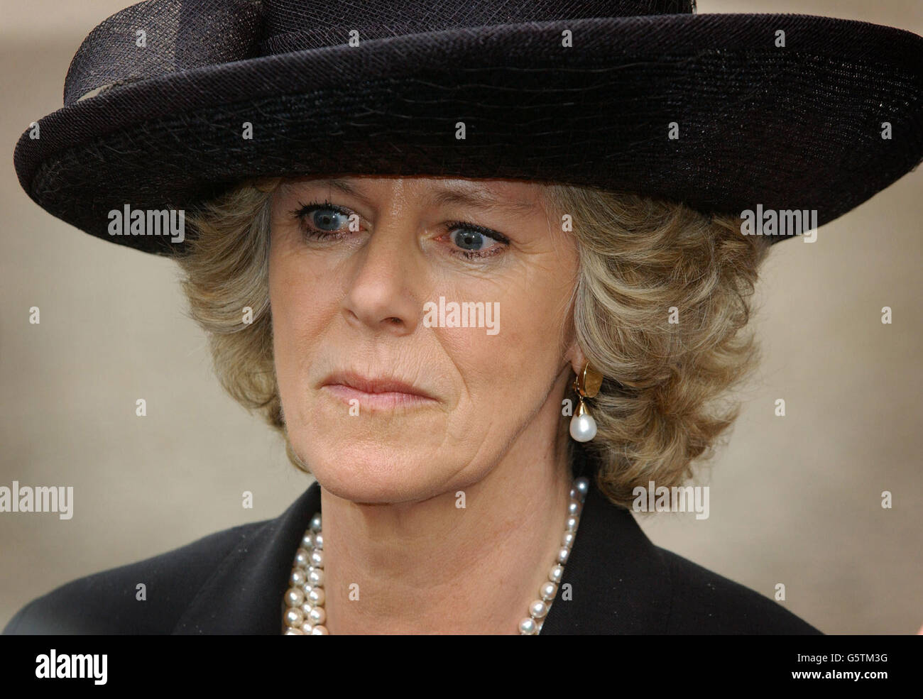 Camilla Parker Bowles, the long-term companion of the Prince of Wales, leaves Westminster Abbey following Princess Margaret's memorial service in London. Princess Margaret, the younger sister of Britain's Queen Elizabeth II, died on February 9, aged 71. Stock Photo