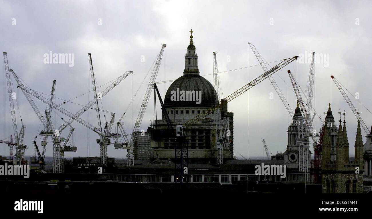 The Dome of St Paul's Cathedral stands in the centre of a building boom in Central London, as work goes on at the site of the old Paternoster Square on the north side of the well-known London landmark. * The construction work on the Cathedral started in 1675, and was completed in 1710 a span of 35 years. 16/1/04: Hopes for an economic recovery have led to an encouraging level of growth in construction industry work, figures showed. The Royal Institution of Chartered Surveyors (RICS) found that 10% more surveyors reported a rise in work than a fall, up 7% on the previous three months. Stock Photo