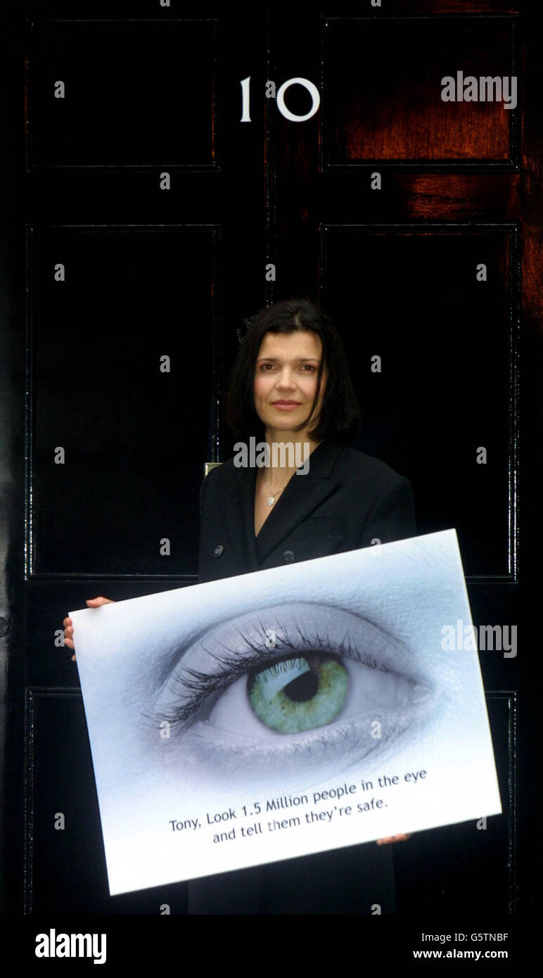 Ali Hewson, wife of U2 singer Bono, stands outside 10 Downing Street - the official London residence of British Prime Minister Tony Blair - with a giant postcard on the16th anniversary of the Chernobyl disaster. *People in Ireland have sent more than a million similar postcards to Mr Blair and the Prince of Wales to their express fears that the Cumbrian power and reprocessing plant threaten the Irish environment and offered a target for terrorists. Stock Photo