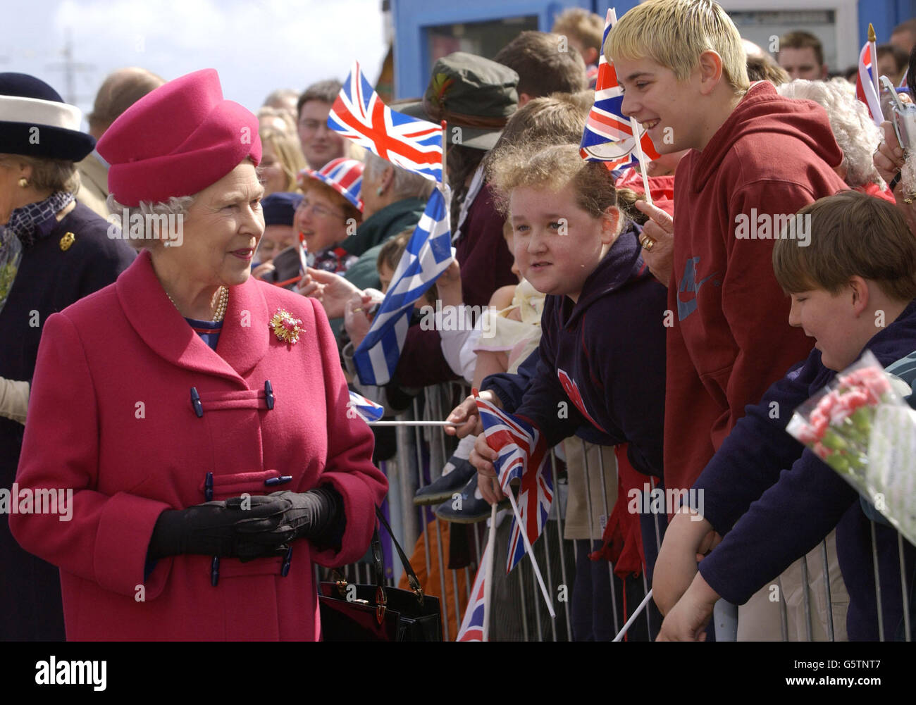 Britain's Queen Elizabeth II greets wellwishers at Falmouth harbour, on the first day of her nationwide Golden Jubilee tour which is starting with a two-day visit to the West Country. * In the coming weeks, the 76-year-old monarch will visit every region of England, Scotland, Wales and Northern Ireland. Stock Photo
