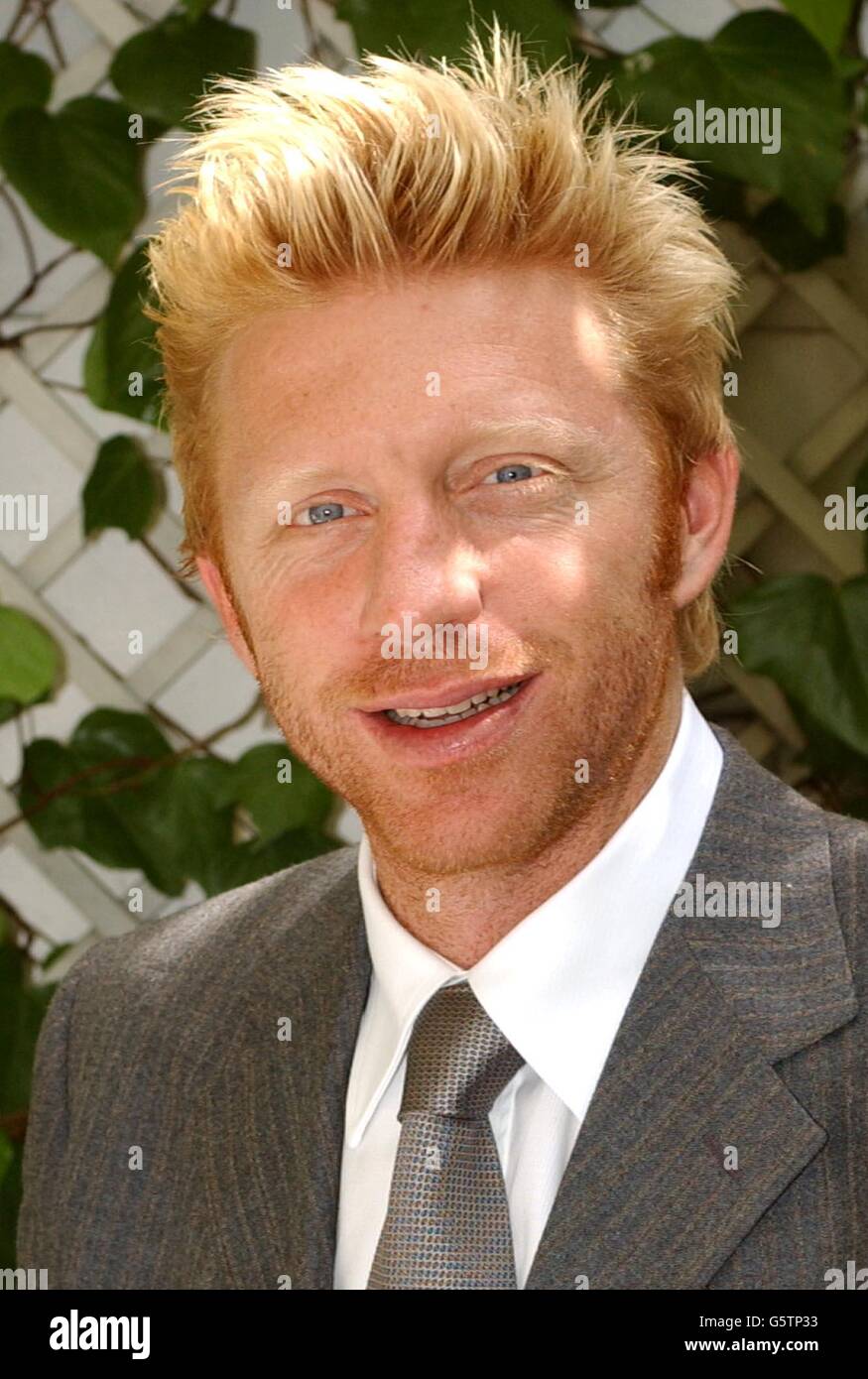 German tennis player Boris Becker at the Halycon Hotel in London, where it was announced that he will be joining the BBC Sport commentary team for the Wimbledon Championships 2002. * 02/05/02: Boris Becker announced he has joined this year's BBC Wimbledon commentary team and delivered a broadside to the men who commentated when he was a champion. The 34-year-old, who rewrote the record books by winning the Wimbledon title in 1985 at the age of just 17, will be joining John McEnroe and Pat Cash, who already commentate for the BBC. Stock Photo