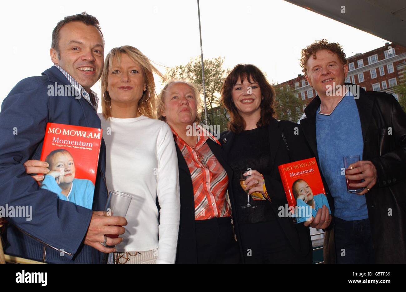 Former Labour MP and Cabinet Minister, Dr Mo Mowlam (centre) with (L-R) Graham Norton, Gaby Roslin, Josie Lawrence and Mick Hucknall during the launch party of Mo Mowlam's autobiography Momentum: The Struggle For Peace, Politics and the People. * at Westminster Boating Base in London. Stock Photo
