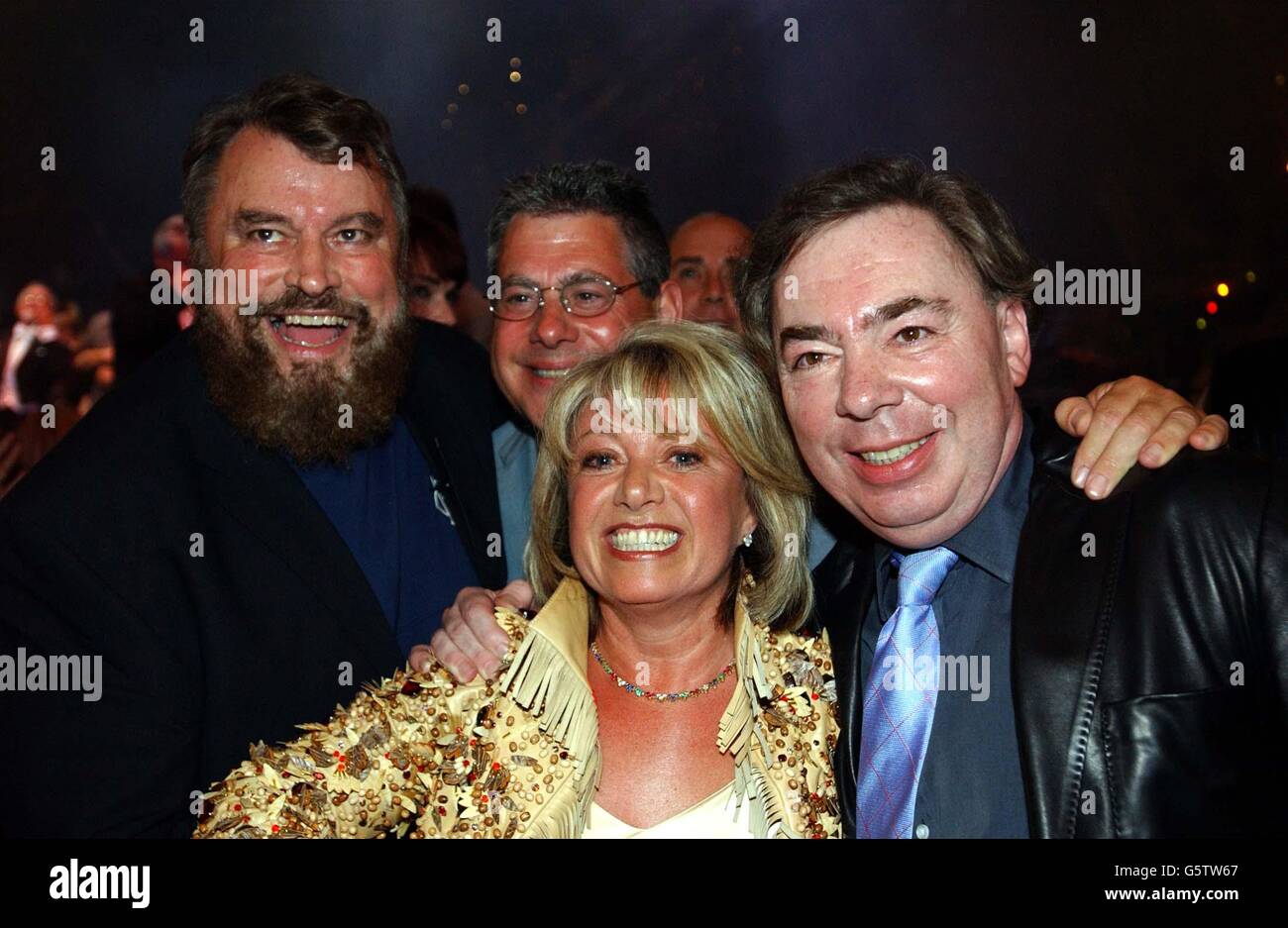 Cats composer Lord Lloyd-Webber (right) and producer Sir Cameron Mackintosh (2nd left) with original cast members Brian Blessed and Elaine Paige, at the New London Theatre as Cats, the record-breaking West End show comes to an end following its 21-year run. Stock Photo