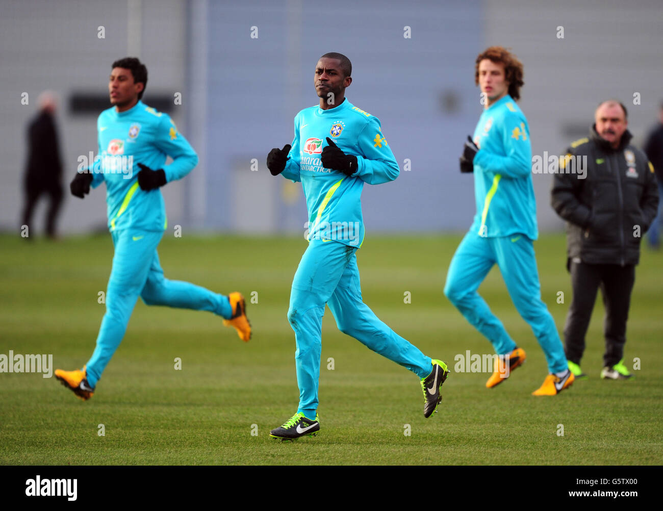 Brazil's Ramires (centre) and David Luiz (right) during the training session at The Hive, London. Stock Photo
