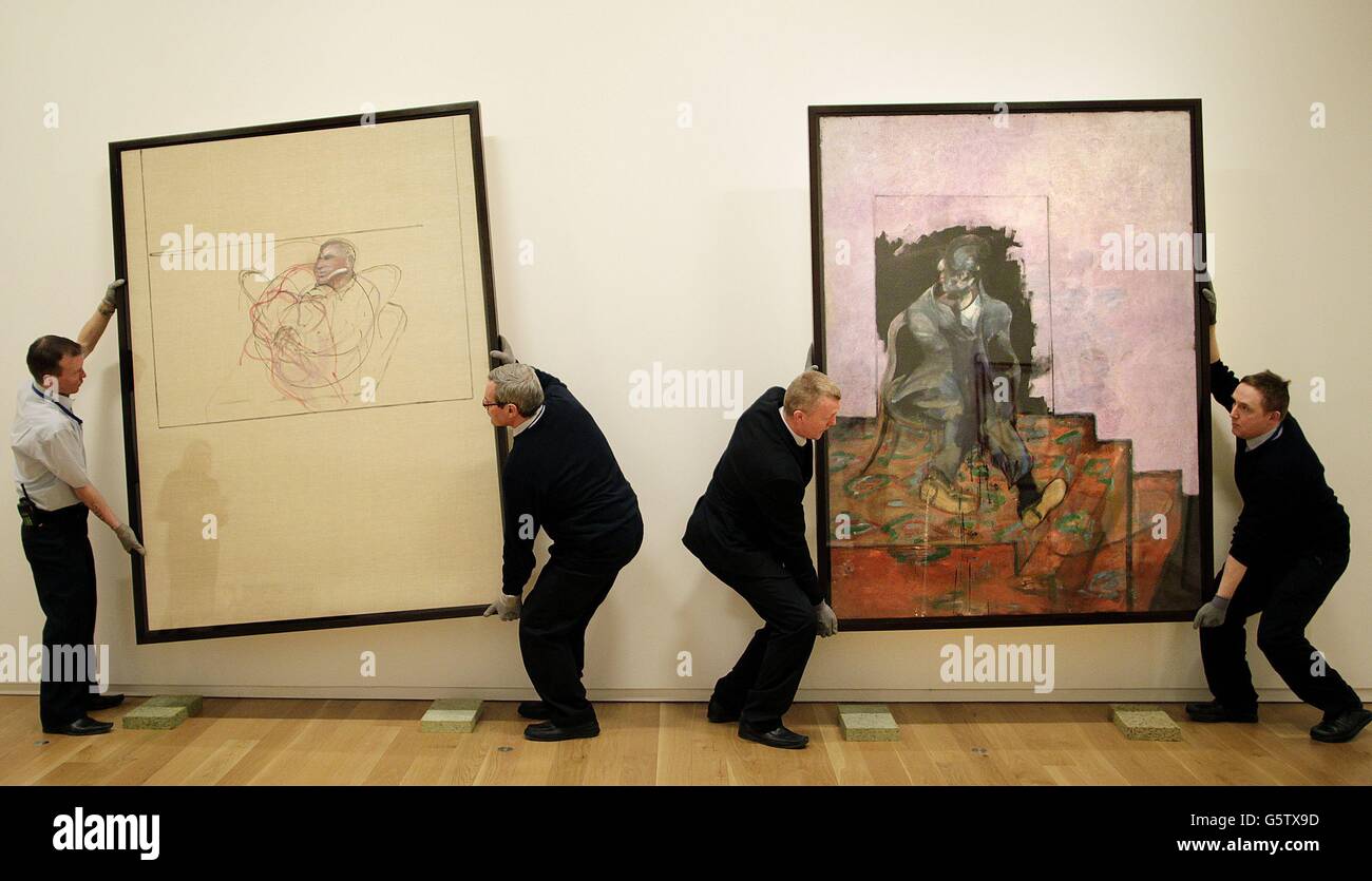 (left to right) Art Handlers Peader Fitzgerald, Christopher Forde, Niall O' Connor and Ger Crotty, lifting two works of art in the Hugh Lane Gallery by Francis Bacon, both called 'unititled, as they prepare to ship them along with other Irish works of art to the BOZAR Centre for Fine Arts, Brussels as part of Culture Ireland's exhibition during Ireland's Presidency of the European Union. Stock Photo