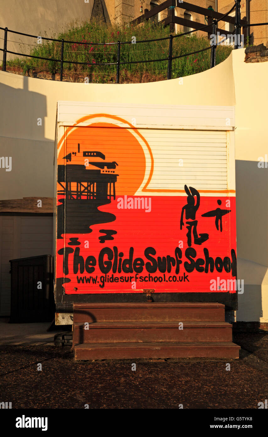 A sign for the Glide Surf School on the promenade at Cromer, Norfolk, England, United Kingdom. Stock Photo