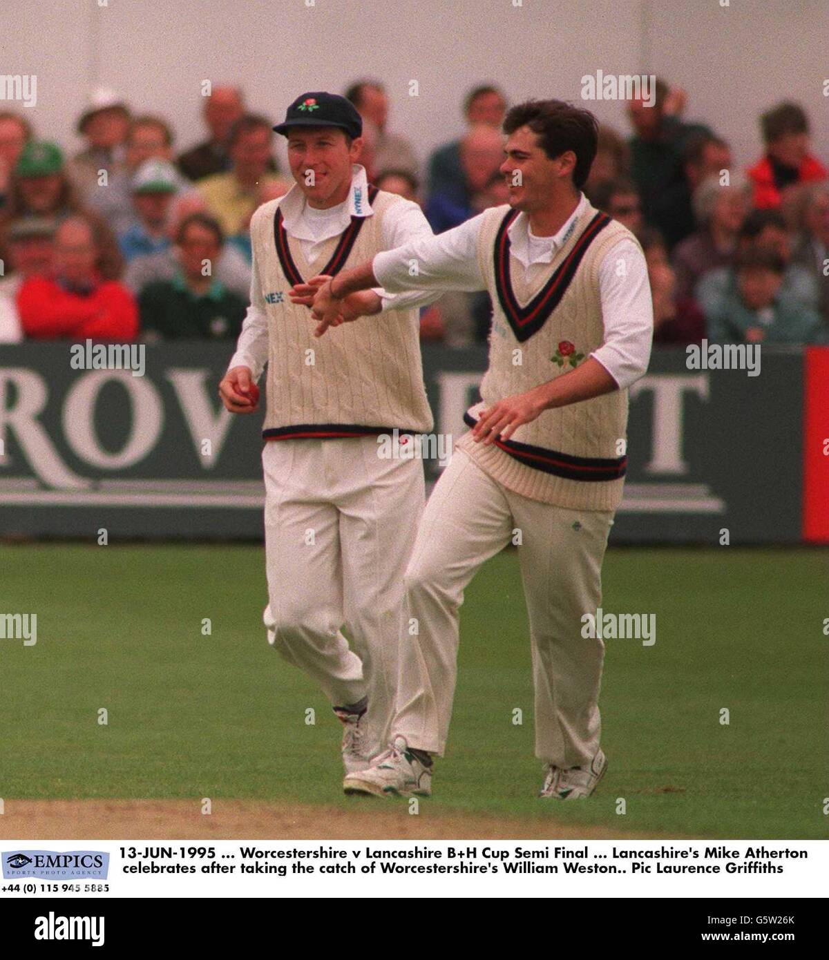 13-JUN-1995, Worcestershire v Lancashire B+H Cup Semi Final, Lancashire's Mike Atherton celebrates after taking the catch of Worcestershire's William Weston Stock Photo
