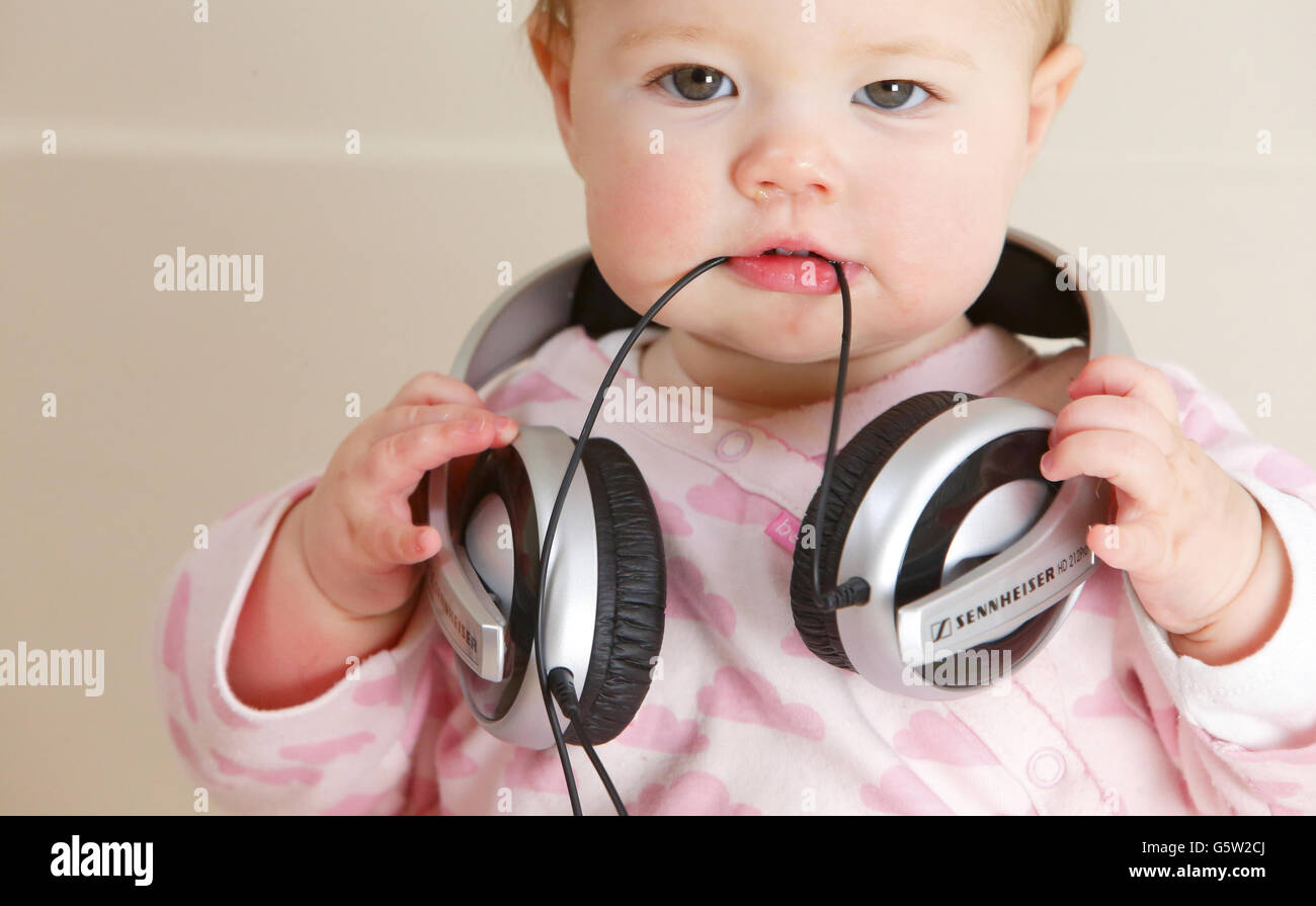 A baby wearing headphones hi-res stock photography and images - Alamy