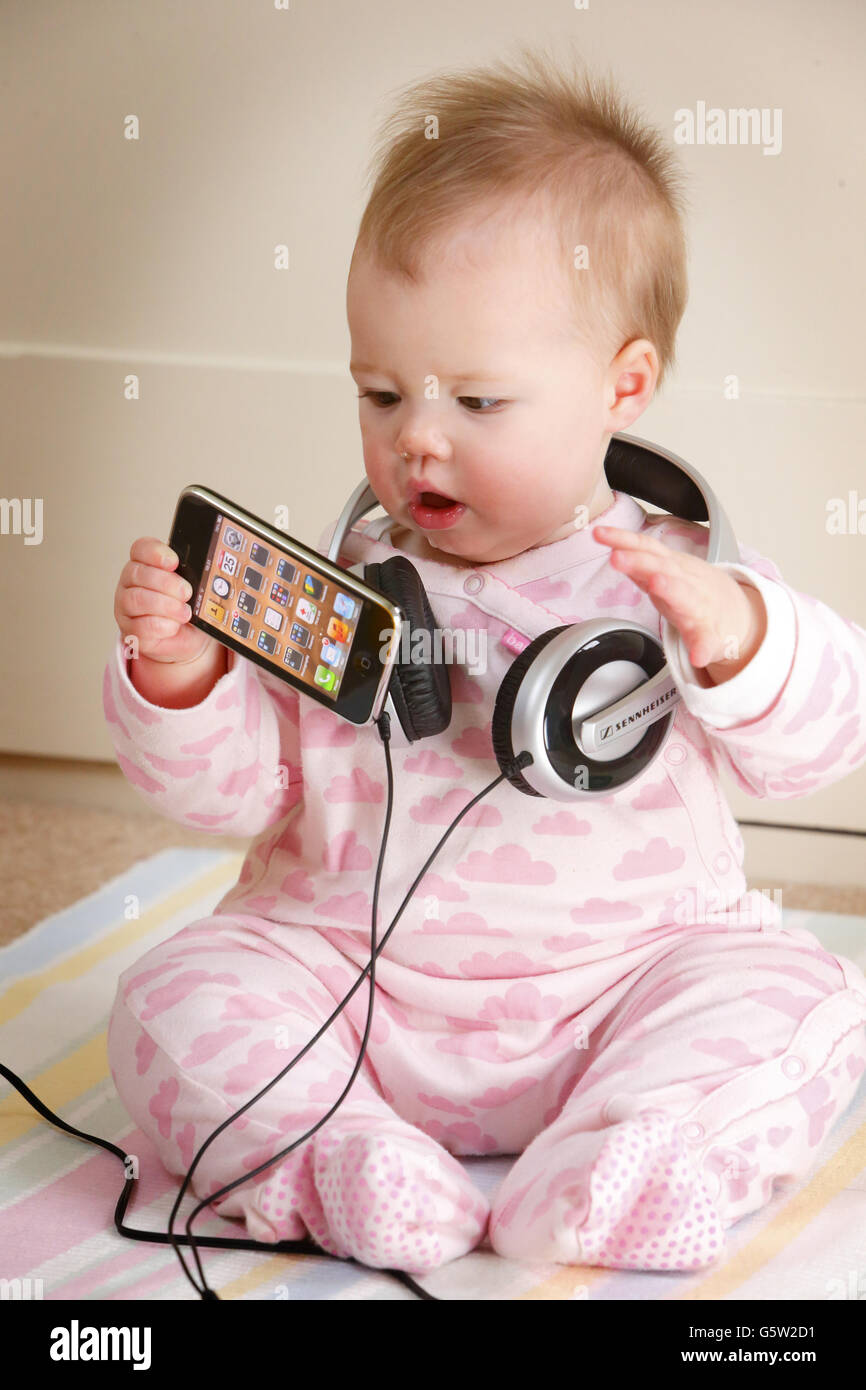 A baby wearing headphones hi-res stock photography and images - Alamy