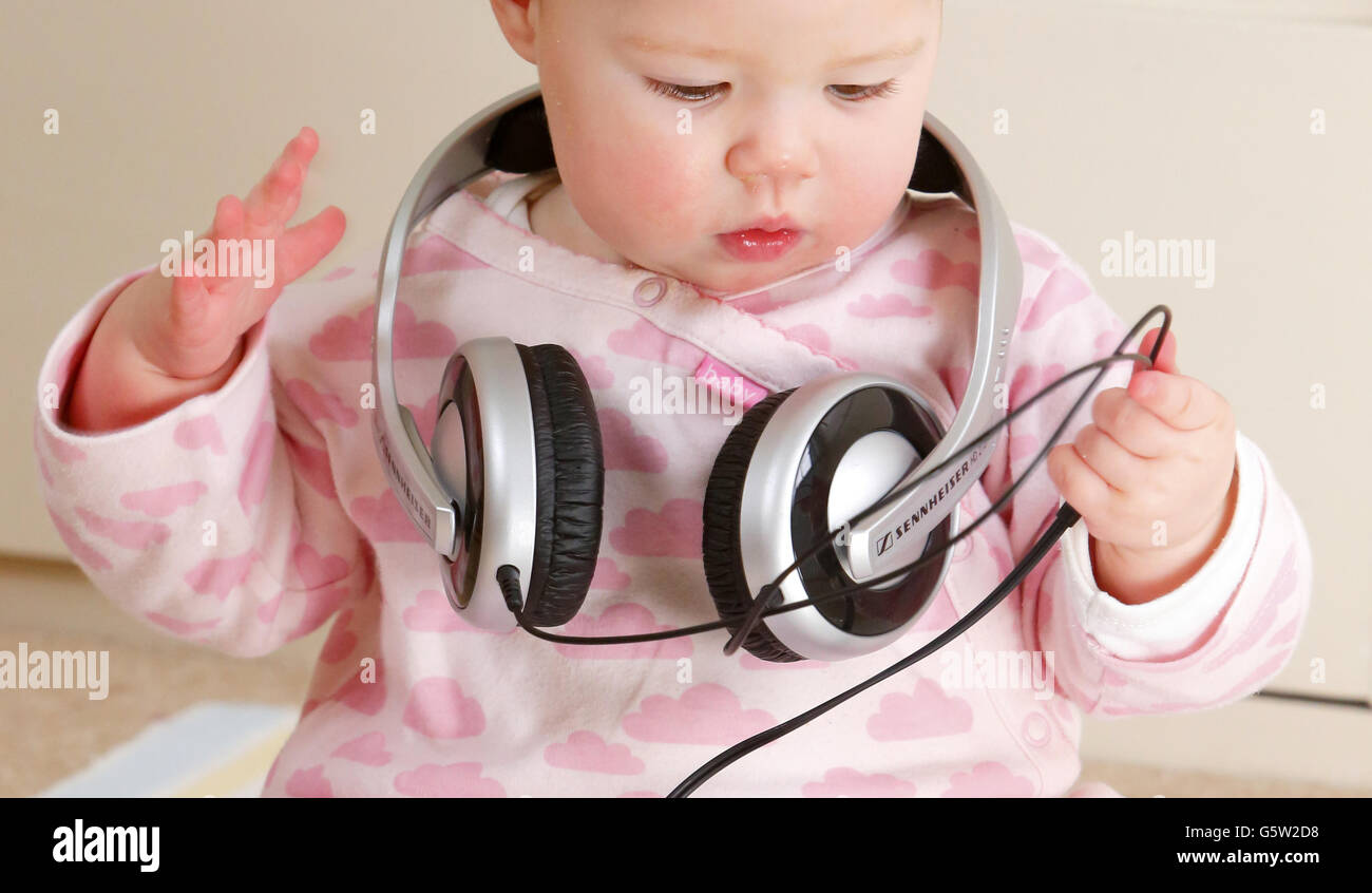 A baby wearing headphones hi-res stock photography and images - Alamy