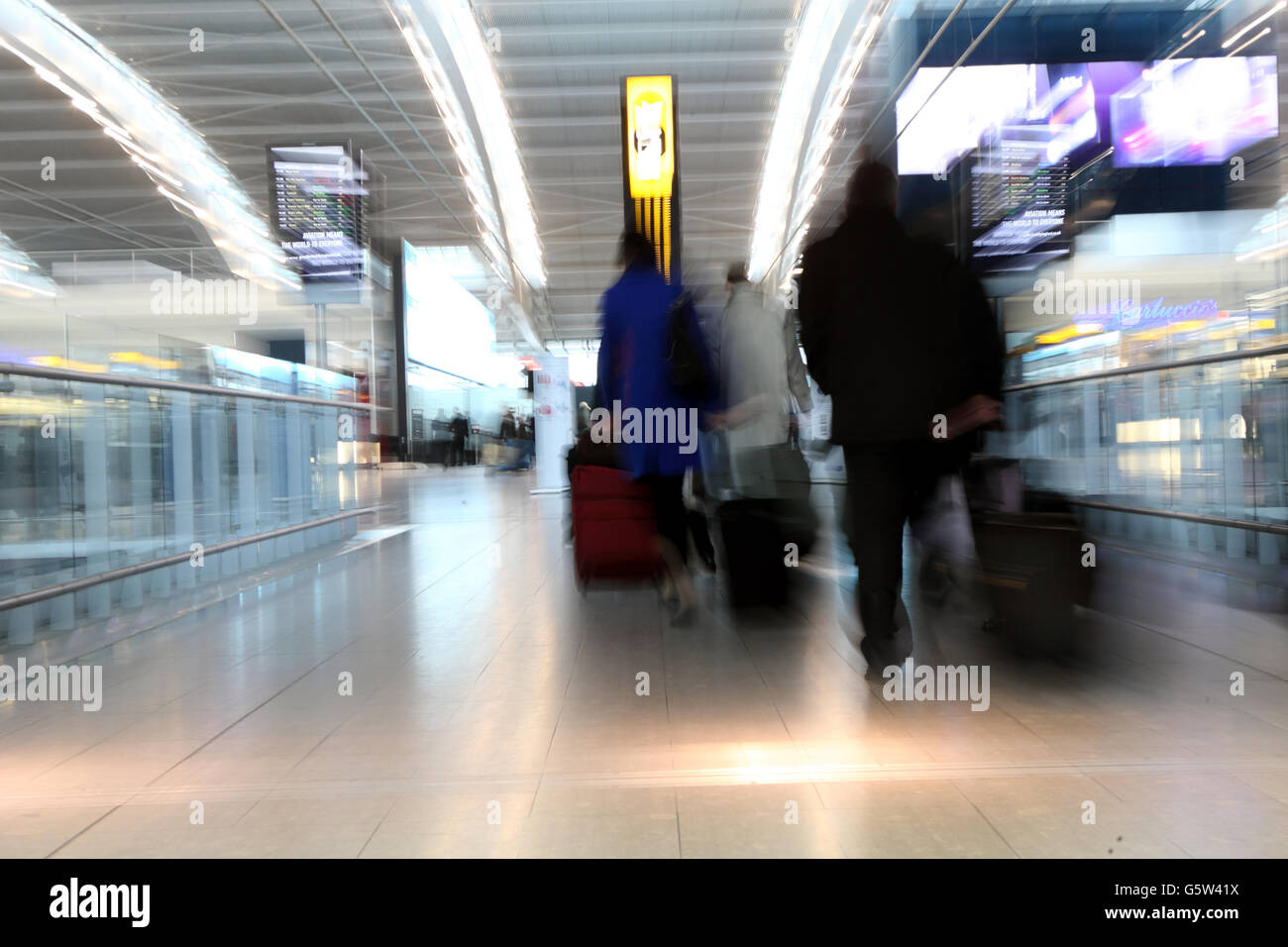 Passengers arrive to check in at terminal 5 of heathrow airport hires