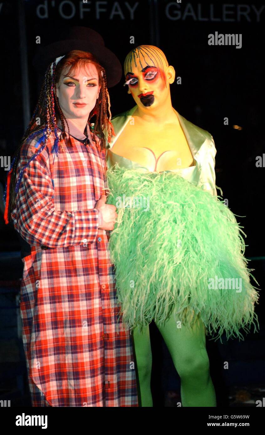 Actor Euan Morton (left, who plays Boy George) with Boy George (who plays Leigh Bowery) during a photocall for the cast change of the musical 'Taboo', at The Venue in Leicester Square. Stock Photo