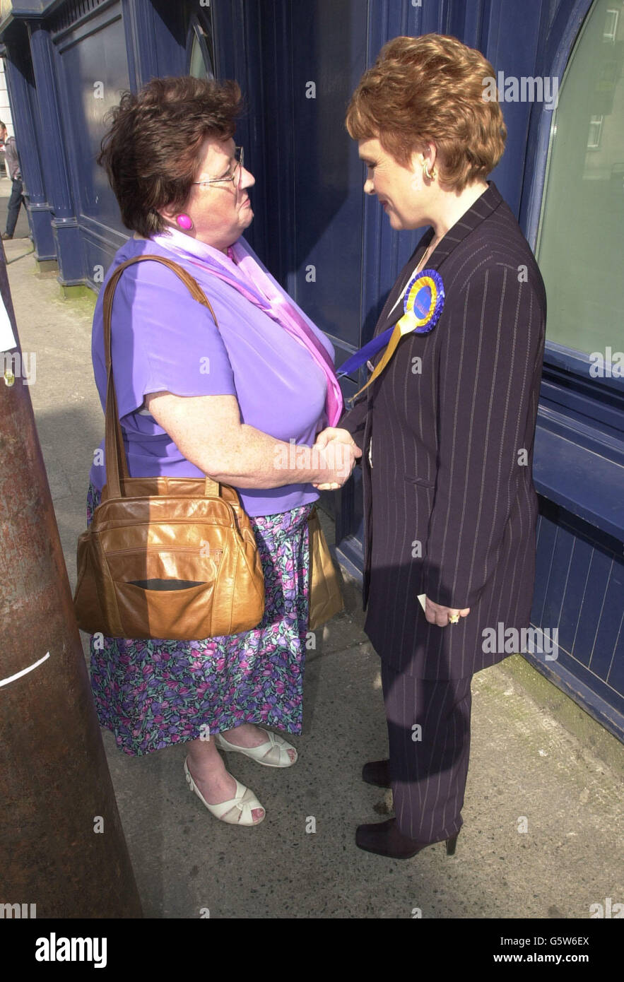 Independent candidate for Galway and former Eurovision Song Contest winner, Dana Rosemary Scallon (right) canvasses for votes in Galway city centre as she prepares for the Irish General Election on 17 May. Stock Photo